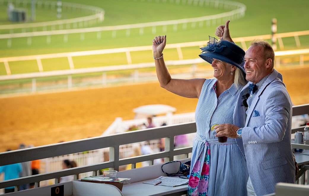 Fans watching Horse Racing at Colonial Downs in New Kent