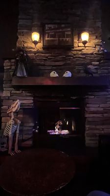 Photo of Murphy's Pub - Seattle, WA, US. Fireplace in October decorated for Halloween