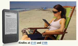 A woman sat on the beach reading a book.