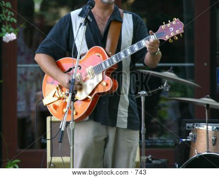 Man Playing Electric Guitar