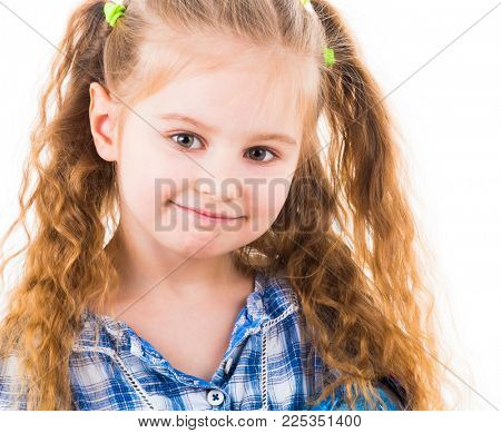 Portrait of cheerful baby girl with blonde wavy hairstyle in plaid blue blouse isolated on white background