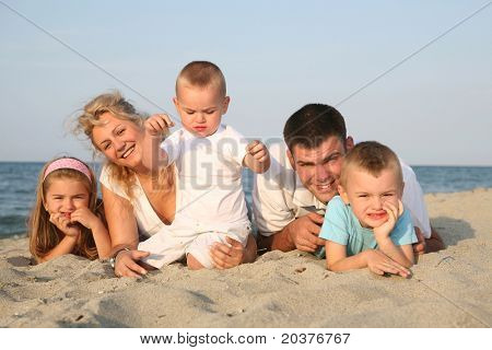 happy family having holiday at the beach