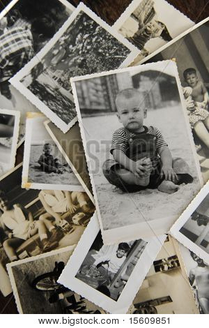 remembering childhood: stack of old photos