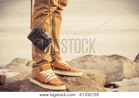 Feet Man And Vintage Retro Photo Camera Outdoor Travel Lifestyle Vacations Concept